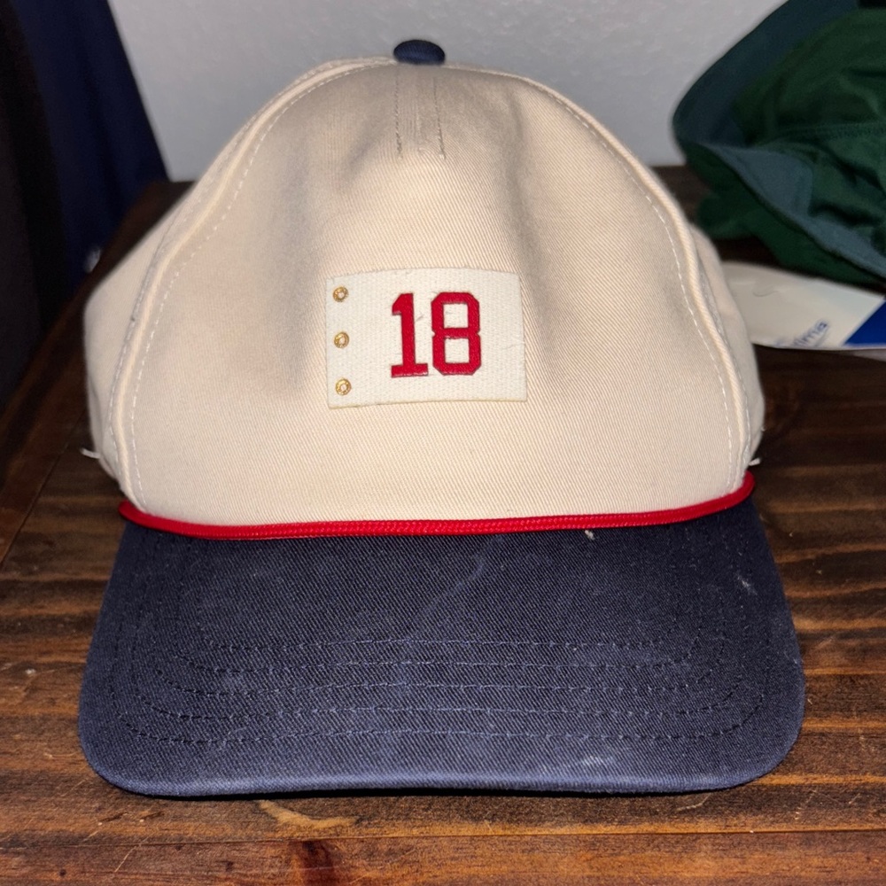 Beige and Navy Baseball Cap with Red Trim